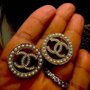Chanel earrings comes with box.